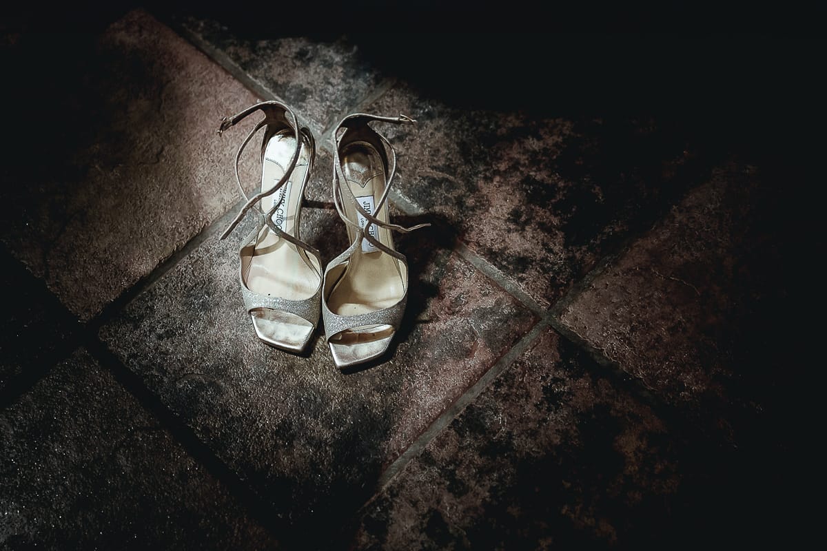 Castello dei Solaro, matrimonio di Noemi e Pietro. Cena. Scarpe Jimmy Chu della sposa.
