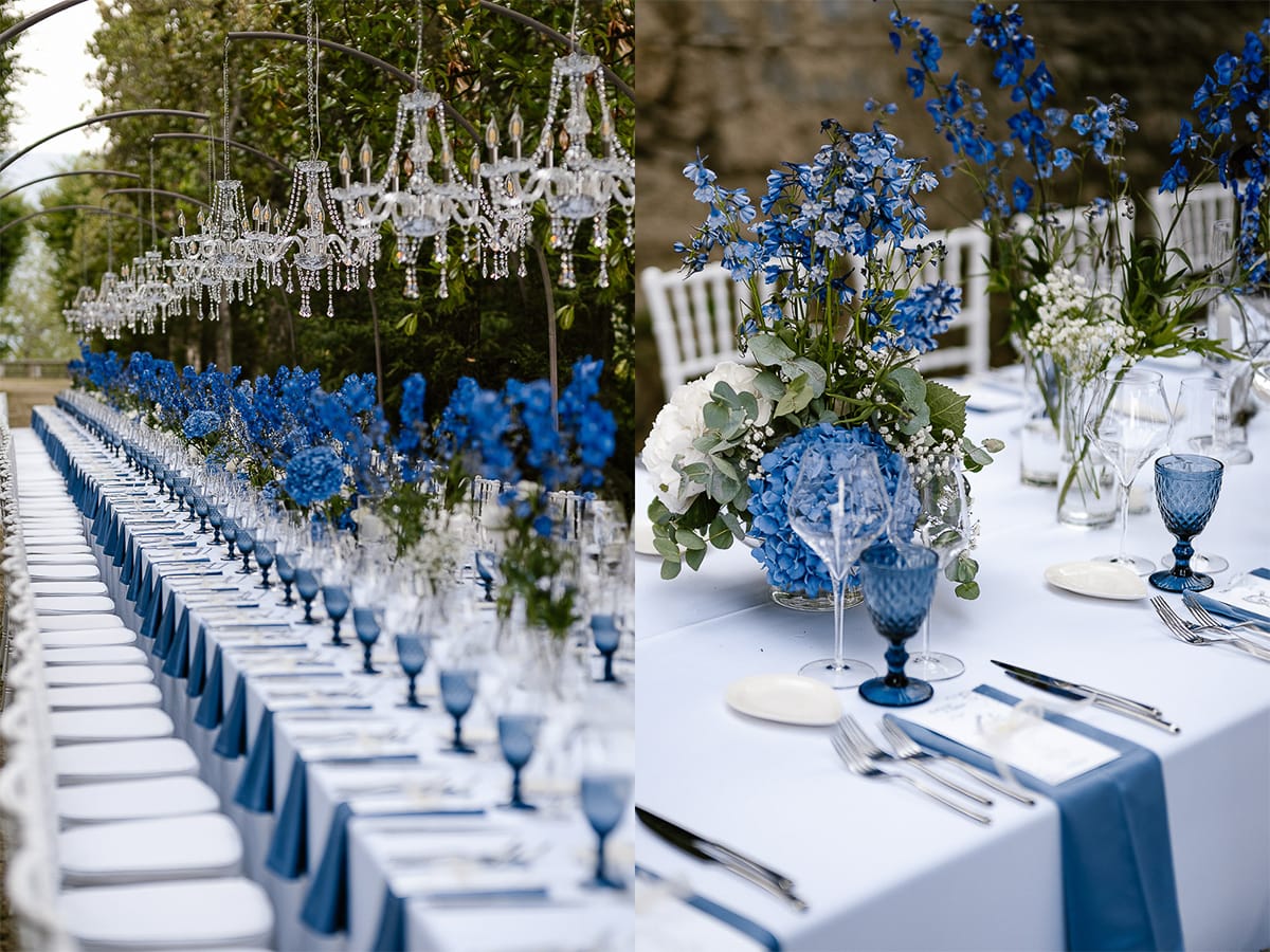 Matrimonio da favola al castello Canalis. Dettaglio del bellissimo tavolo imperiale con lampadari a goccia, fiori, tovaglioli e bicchieri blu.