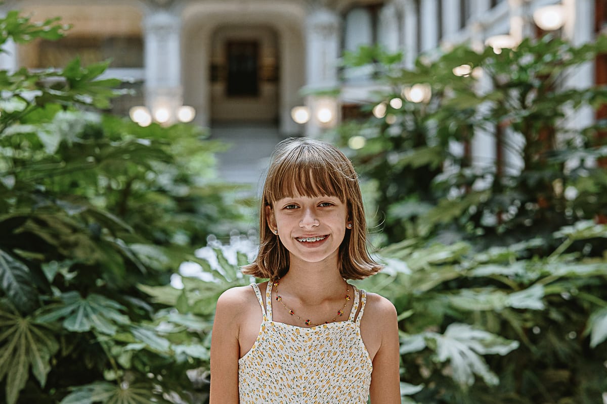 Fotografia di famiglia in vacanza a Torino: Emma in Galleria Subalpina